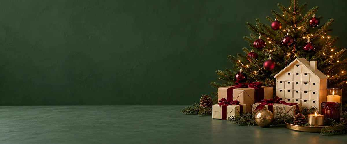 A cozy Christmas scene with an advent calendar, wrapped gifts and a decorated tree.